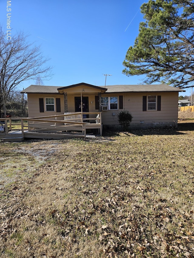 view of front of home with a wooden deck