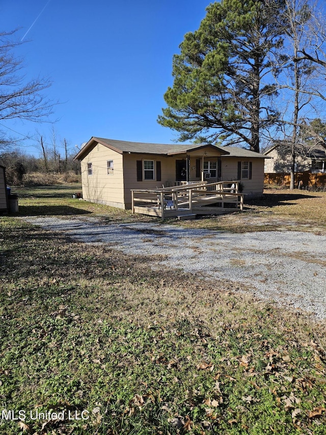 view of front of house with a deck