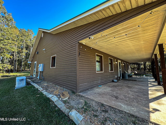 106 Crockrell Rd, Lexington, MS 39095 - view of side of home featuring a yard and a patio area