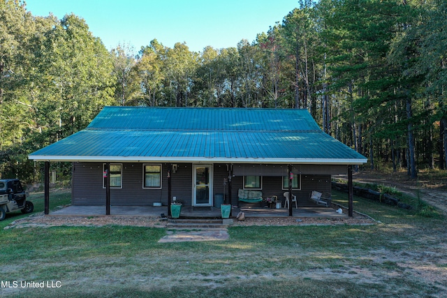 view of front of house with a porch and a front lawn