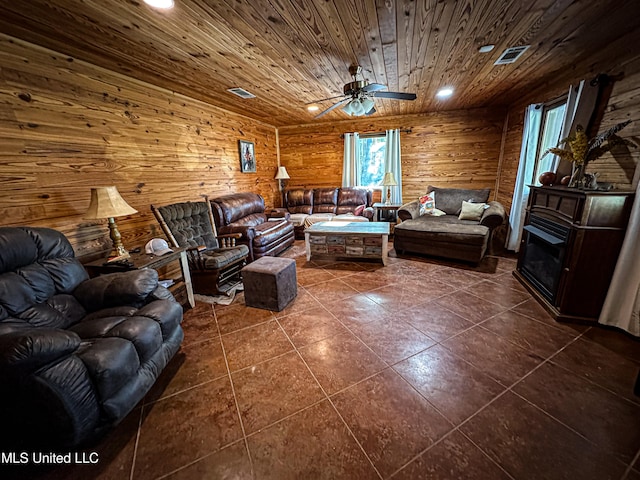 106 Crockrell Rd, Lexington, MS 39095 - tiled living room featuring wooden ceiling, a fireplace, and ceiling fan