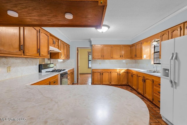 kitchen with tasteful backsplash, white refrigerator with ice dispenser, crown molding, and gas range