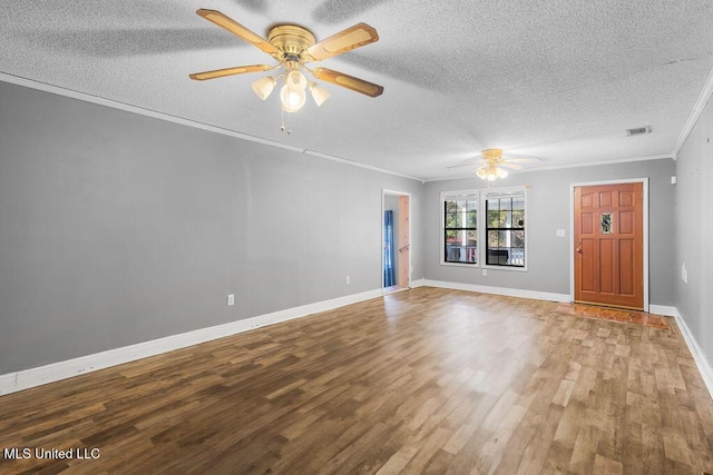 unfurnished living room with hardwood / wood-style floors, a textured ceiling, ceiling fan, and crown molding