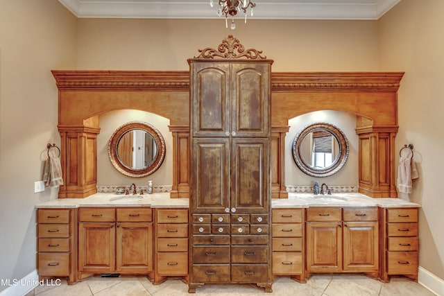 bathroom featuring vanity, ornamental molding, and tile patterned floors