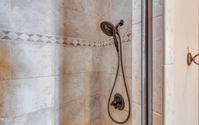 room details with a tile shower