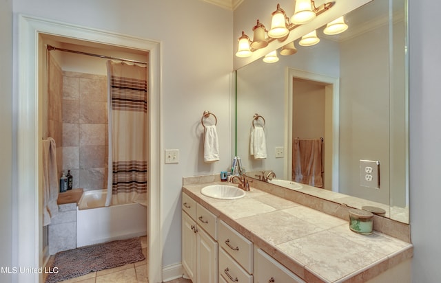 bathroom with vanity, crown molding, shower / bath combo with shower curtain, and tile patterned flooring