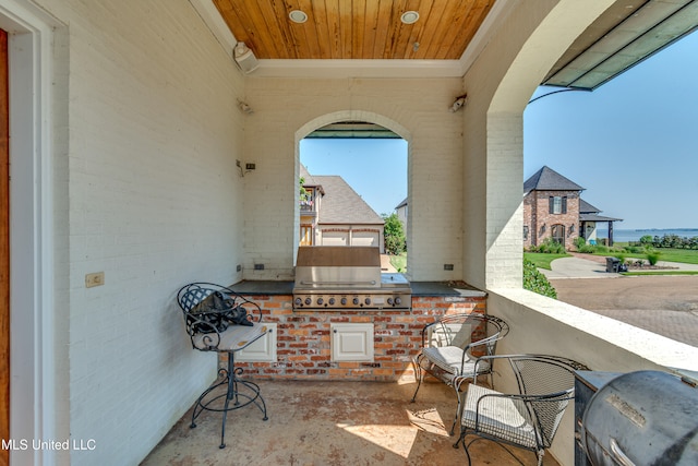 view of patio with a grill