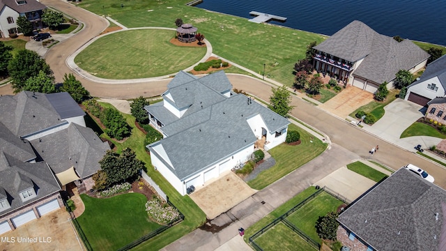 drone / aerial view with a water view