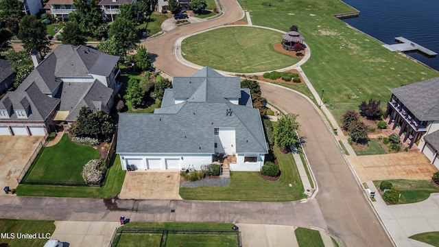 drone / aerial view with a water view