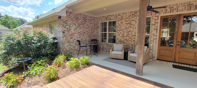 133 Sycamore Rdg, Madison, MS 39110 - view of exterior entry featuring brick siding, french doors, and a wooden deck