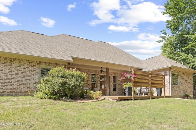 133 Sycamore Rdg, Madison, MS 39110 - back of property with brick siding, roof with shingles, a lawn, ceiling fan, and a wooden deck