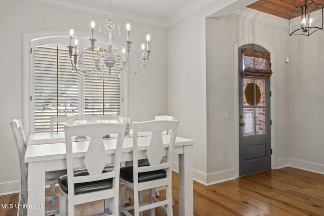 133 Sycamore Rdg, Madison, MS 39110 - dining room featuring a chandelier, baseboards, wood finished floors, and ornamental molding