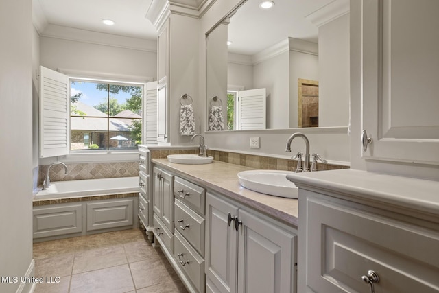 133 Sycamore Rdg, Madison, MS 39110 - bathroom with double vanity, a garden tub, ornamental molding, tile patterned flooring, and recessed lighting