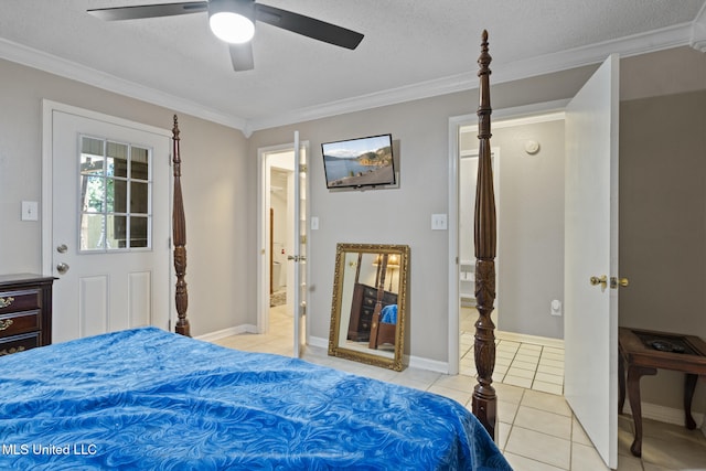 4504 E Magnolia Cv, Diberville, MS 39540 - bedroom featuring crown molding, light tile patterned floors, a textured ceiling, a ceiling fan, and baseboards