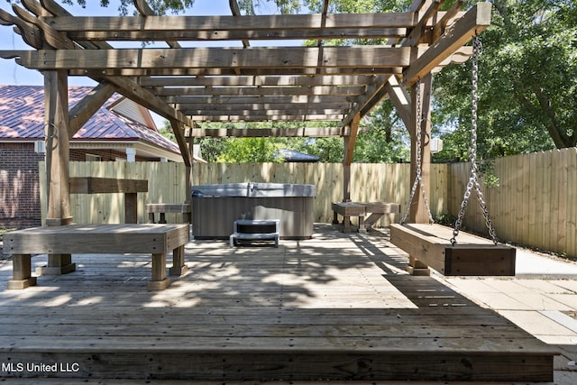 4504 E Magnolia Cv, Diberville, MS 39540 - wooden terrace featuring a hot tub, a fenced backyard, and a pergola