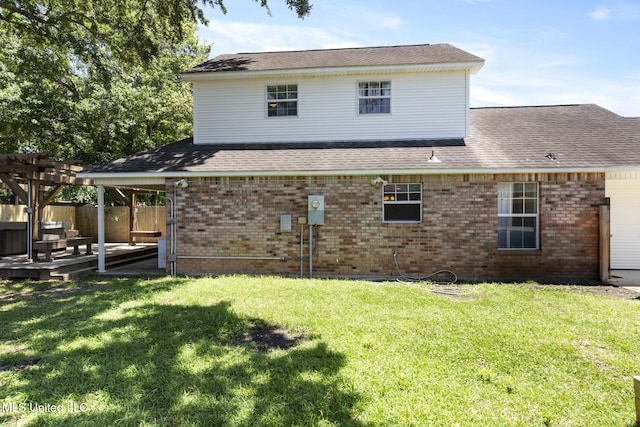4504 E Magnolia Cv, Diberville, MS 39540 - back of property featuring brick siding, roof with shingles, and a pergola