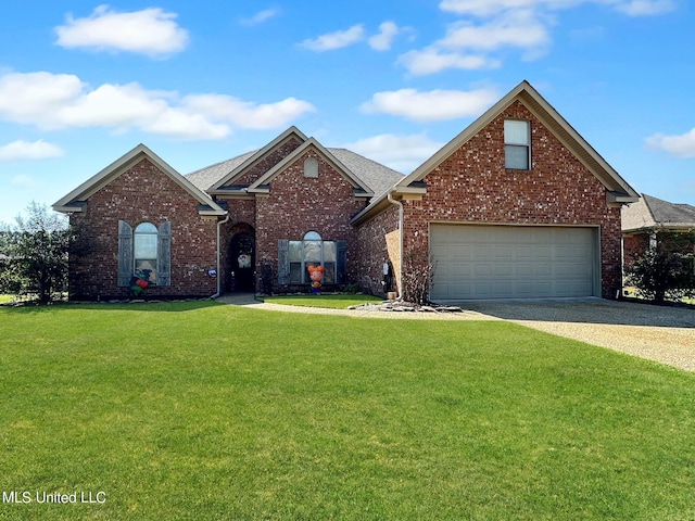 front of property featuring a garage and a front lawn