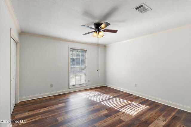 125 Lakeview Dr, Canton, MS 39046 - unfurnished room featuring crown molding, ceiling fan, wood finished floors, and baseboards