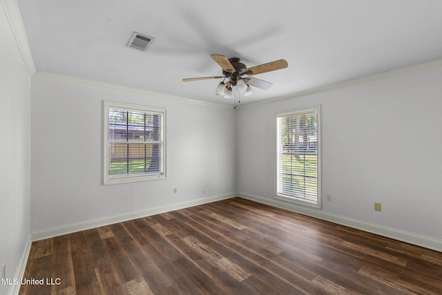 125 Lakeview Dr, Canton, MS 39046 - unfurnished room with ornamental molding, plenty of natural light, dark wood-type flooring, baseboards, and a ceiling fan
