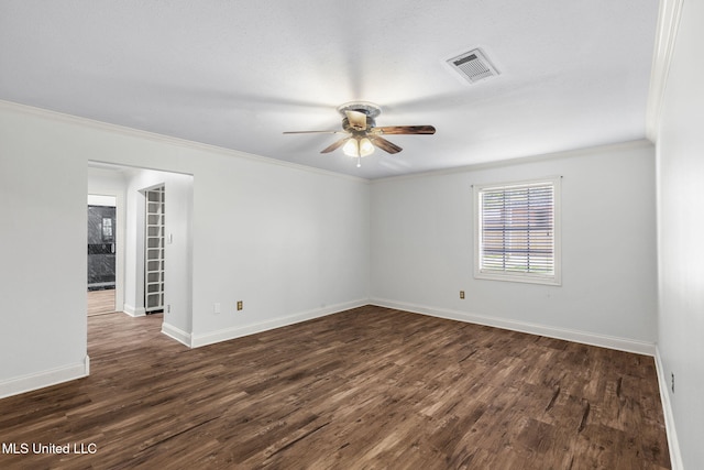125 Lakeview Dr, Canton, MS 39046 - spare room with ceiling fan, crown molding, dark wood-type flooring, and baseboards