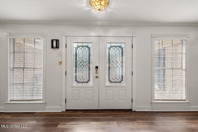 125 Lakeview Dr, Canton, MS 39046 - foyer featuring wood finished floors, ornamental molding, baseboards, and healthy amount of natural light