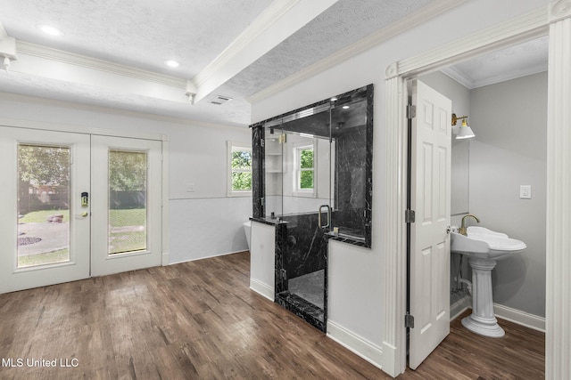 125 Lakeview Dr, Canton, MS 39046 - interior space with french doors, dark wood finished floors, a textured ceiling, ornamental molding, and baseboards