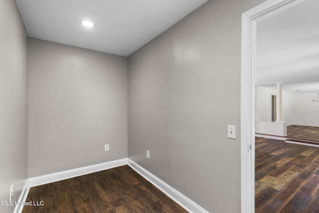 125 Lakeview Dr, Canton, MS 39046 - unfurnished room featuring dark wood finished floors, baseboards, and recessed lighting