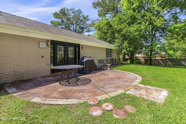 125 Lakeview Dr, Canton, MS 39046 - view of patio featuring a grill and french doors