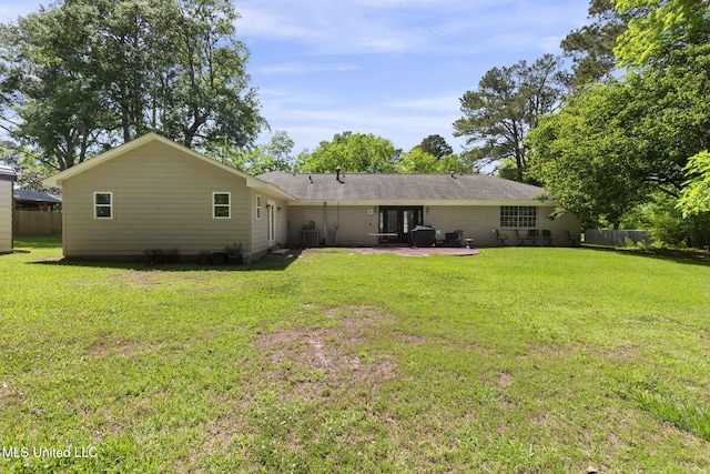 125 Lakeview Dr, Canton, MS 39046 - rear view of house with a patio area and central air condition unit