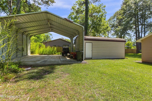 125 Lakeview Dr, Canton, MS 39046 - view of parking / parking lot with a detached carport