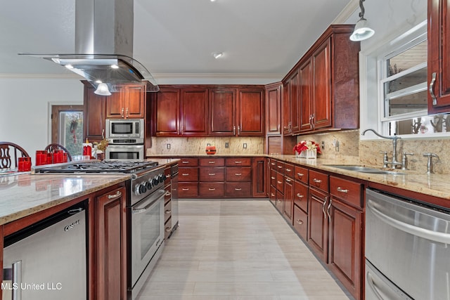 kitchen featuring pendant lighting, sink, light stone countertops, appliances with stainless steel finishes, and island range hood