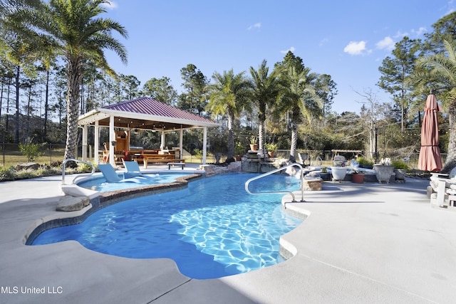 view of pool featuring a gazebo, a patio area, and a jacuzzi