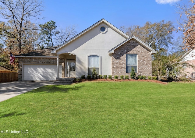 view of front facade with a garage and a front lawn