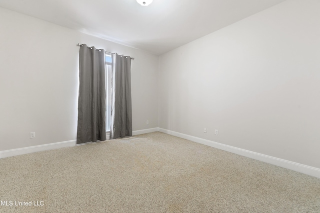 spare room with carpet flooring