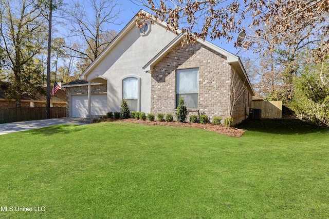 view of front facade with a front lawn, a garage, and cooling unit