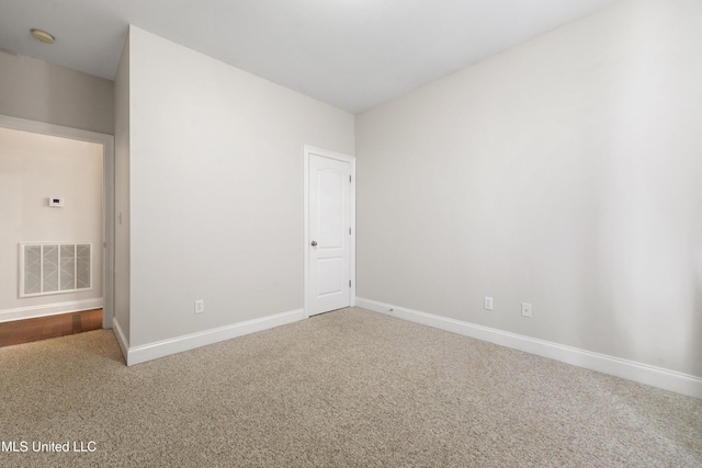 empty room with carpet floors