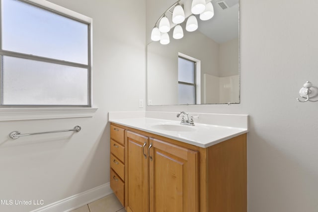 bathroom with vanity and tile patterned flooring