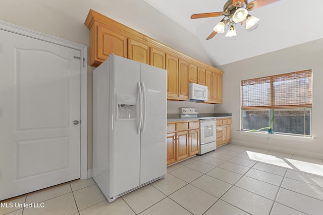 kitchen with ceiling fan, white appliances, light tile patterned flooring, light brown cabinetry, and vaulted ceiling