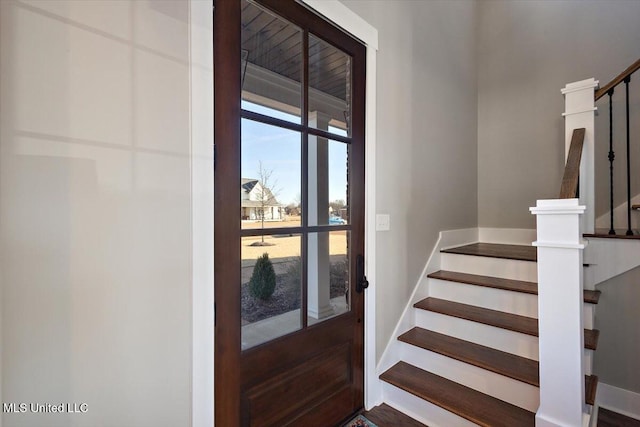 foyer featuring stairs