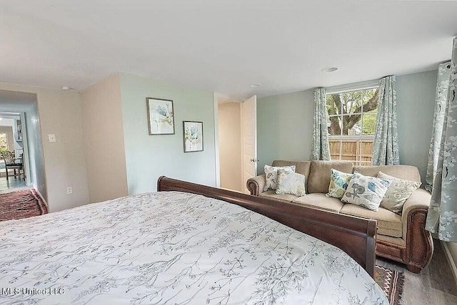 bedroom featuring hardwood / wood-style flooring