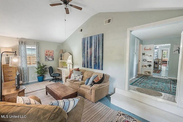 living room with vaulted ceiling and ceiling fan