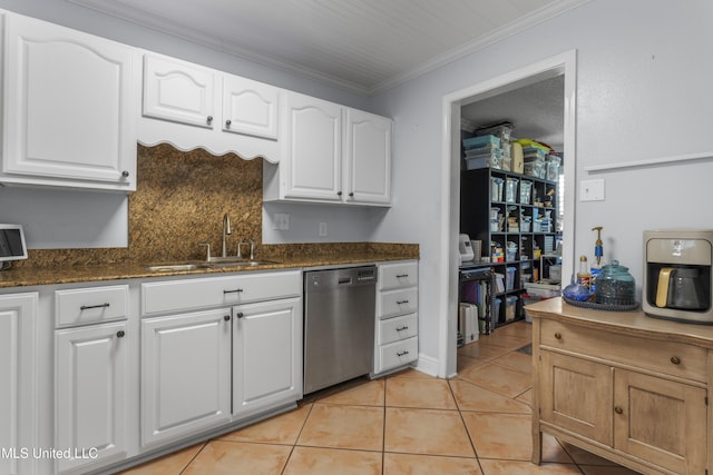 9000 Spring Ave, Ocean Springs, MS 39564 - kitchen with crown molding, tasteful backsplash, dishwasher, a sink, and white cabinets