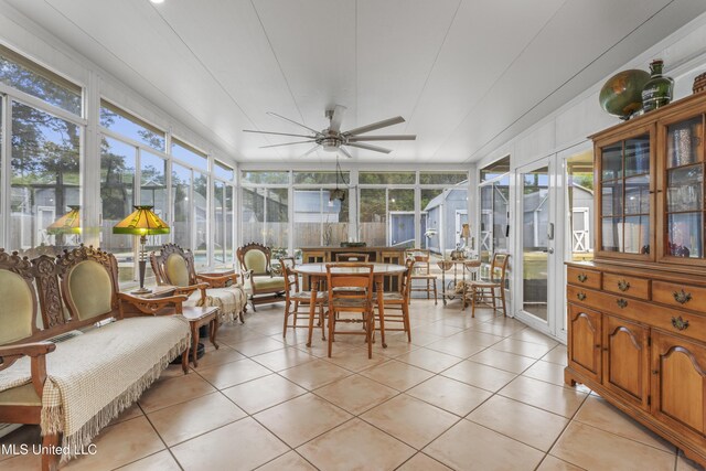 9000 Spring Ave, Ocean Springs, MS 39564 - sunroom / solarium with ceiling fan, tile patterned floors, and outdoor dining space