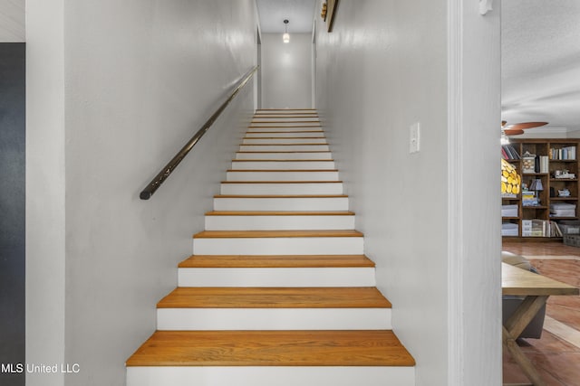 9000 Spring Ave, Ocean Springs, MS 39564 - stairway featuring ceiling fan and wood finished floors