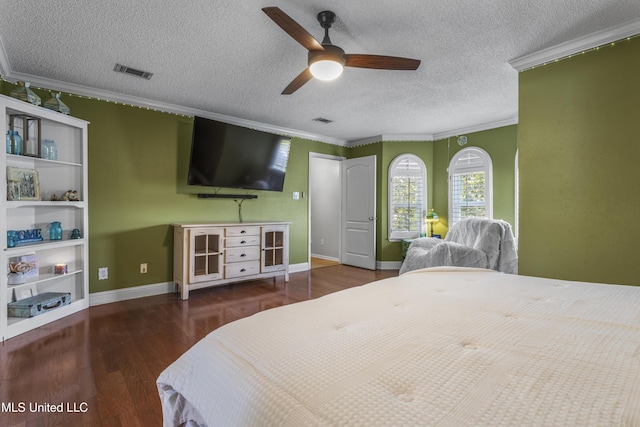 9000 Spring Ave, Ocean Springs, MS 39564 - bedroom with ornamental molding, wood finished floors, and visible vents