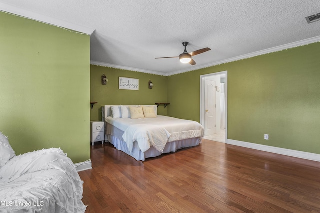 9000 Spring Ave, Ocean Springs, MS 39564 - bedroom featuring baseboards, crown molding, and wood finished floors
