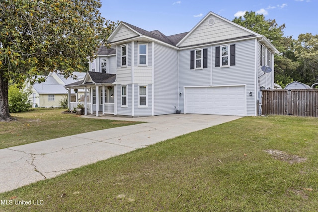 9000 Spring Ave, Ocean Springs, MS 39564 - view of front of property with a garage, a front lawn, fence, covered porch, and driveway