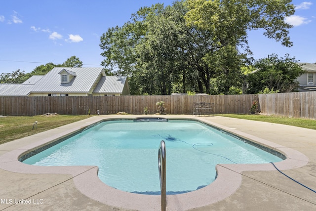 9000 Spring Ave, Ocean Springs, MS 39564 - view of swimming pool featuring a fenced in pool, a fenced backyard, a yard, and a patio