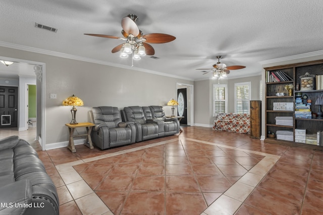 9000 Spring Ave, Ocean Springs, MS 39564 - living area featuring tile patterned flooring, a ceiling fan, and visible vents