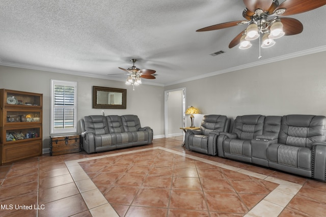 9000 Spring Ave, Ocean Springs, MS 39564 - living room featuring ceiling fan, visible vents, crown molding, tile patterned flooring, and baseboards